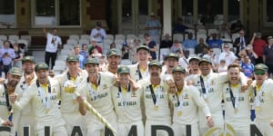 The Australian team celebrate winning the World Test Championship.
