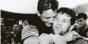Two tries and a grand final win in his last game of Rugby League... an elated Royce Simmons is embraced by Mark Geyer at full-time on September 22,1991.