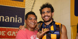 Special memories:Cyril Rioli celebrates with his Dad after the 2015 premiership.