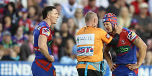 Kalyn Ponga receives treatment for his shoulder injury.