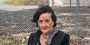 Jan Goates outside the old state research farm,where she grew up in the 1950s and ’60s. 