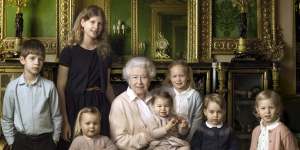 The Queen with grandchildren James and Louise,and great grandchildren Mia Tindall,Princess Charlotte,Savannah Phillips,Prince George and Isla Phillips.