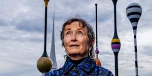Artist Mikala Dwyer in front of her artwork,titled Monuments for Fishes,at Waterman’s Cove,in Barangaroo,Sydney.