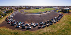 Aerial view of cars queuing for COVID-19 testing at Dubbo Showground today.