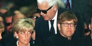 Diana,Princess of Wales,German fashion designer Karl Lagerfeld and British pop-star Elton John attend the memorial mass for Gianni Versace in Milan in 1997.