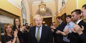Boris Johnson was greeted with applause as he returned to Number 10 after the 2019 election victory.