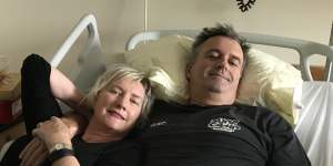 Geoff Martin,58,with his wife Therese Martin. He went to hospital three times before he was diagnosed with encephalitis.