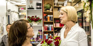 Kristina Keneally meets florist Kim Duong while campaigning in the Fowler electorate.