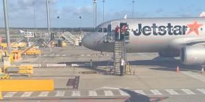 Emergency slide deployed after Jetstar passenger forced open emergency exit door