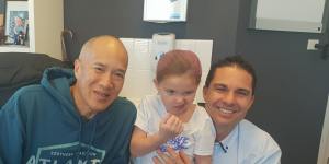 Charlie Teo with Bella Howard and her father Gene.