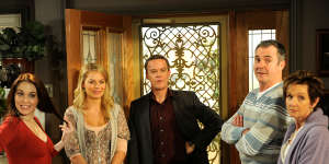 Neighbours cast on set:Kym Valentine,Margot Robbie,Stefan Dennis,Alan Fletcher and Jackie Woodburne.