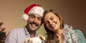 Poppy Cook,partner Ryland Mollard and dog Leila have gotten into the Christmas spirit early this year.