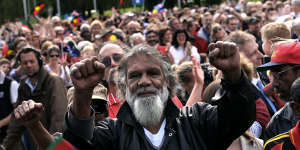  Reg Edwards raises his fists in triumph at Rudd's speech. 