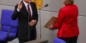 Olaf Scholz is sworn in at the Bundestag in Berlin on Wednesday,ending the Angela Merkel era.