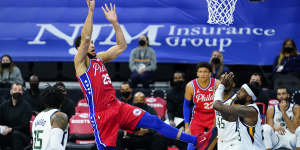 Philadelphia 76ers’ Ben Simmons (25) goes up for a shot.