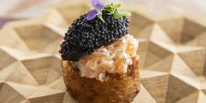 Potato with caviar and salmon tartare.