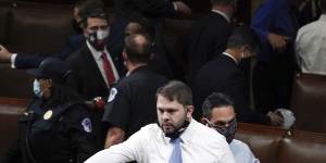 Democrat Ruben Gallego jumped on a chair to coordinate the evacuation from the House Chamber.