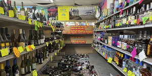 Broken bottles are scattered on the floor at a bottleshop in Rio Dell,California. 