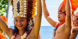 Polynesian women perform traditional dance in Papeete,French Polynesia.