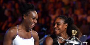 Serena Williams,right,with sister Venus,after beating her in the 2017 Australian Open final. 