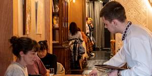 Staff in national costume at Otakoi Ukrainian Restaurant.