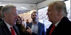 Then-president Donald Trump talking to his chief of staff Mark Meadows before Trump spoke at the rally on the Ellipse that preceded the US Capitol riot on January 6,2021.