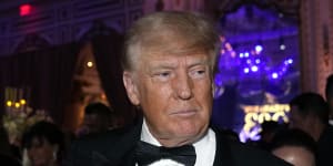 Former President Donald Trump arrives for a New Year’s Eve party at Mar-a-Lago,in Palm Beach,Florida on Saturday night.