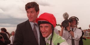 A young James Packer celebrates with jockey Greg Hall after his victory on Merlene in the 1996 Golden Slipper at Rosehill.