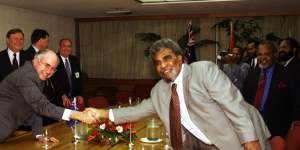 Mr Morauta meeting then prime minister John Howard in Port Moresby.