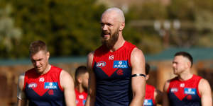 Max Gawn leads the Demons off the field after being thrashed by Fremantle.