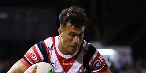 Joseph Suaalii was playing strongly for the Roosters but later left the game with a concussion.