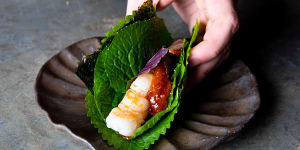 Aromatic leaves provide the wrapper for the Skull Island prawn “taco”.