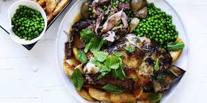 Autumn feast:slow-roasted lamb with tarragon,peas and crispy potatoes