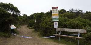 Police tape blocks the entrance to Number 16 Beach at Rye on Monday.