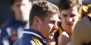 Sam Mitchell addresses his players during the Round 16 VFL match between Collingwood and Box Hill Hawks at the Holden Centre.