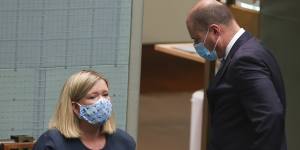 Liberal MP Bridget Archer in discussion with Treasurer Josh Frydenberg after she crossed the floor on Thursday.