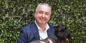 Family lawyer Michael Tiyce with his dog Ferdinand.
