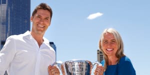 Simon Black and Tourism Minister Kate Jones MP with the AFL premiership trophy.