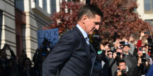 Michael Flynn leaves a federal court in Washington after pleading guilty.