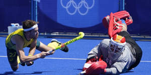 Flynn Ogilvie lands one of the penalties to help Australia to the semis in the men’s hockey competition. 