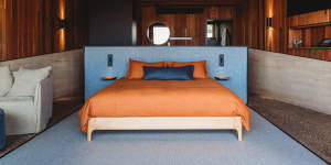 The king bed faces outwards,offering views to the orchard and the night sky.