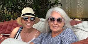 Annalouise Spence (left) with her employer Judith Neilson in Cuba in 2018.
