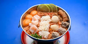 Go-to dish:Ultimate bowl with prawns,scallops,calamari,crispy pork,instant noodles and egg yolks.