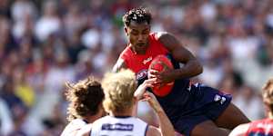 Kysaiah Pickett of the Demons takes a spectacular mark during the round six AFL match between Melbourne Demons and Fremantle Dockers at Melbourne Cricket Ground.