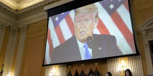 A video of former US president Donald Trump is displayed as members of the House select committee to investigating the January 6 attack on the US Capitol held its last public meeting on December 19.