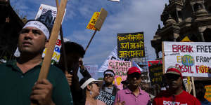 Climate activists gather to participate for Climate Justice March demanding an end to fossil fuels in Lalitpur,Nepal,on Saturday.