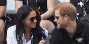 Harry and Meghan at the Invictus Games in 2017,not long after Tominey broke the story of their relationship,