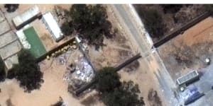 Satellite images show before (top) and after an airstrike hit a migrant detention facility in Tripoli,Libya. 