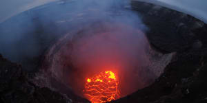 Giant rocks spewing from Hawaii volcano summit