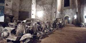 The remains of vintage cars and motorcycles in the Borbone family’s tunnel.